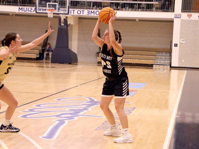 Penn State DuBois sophomore forward Rebecca Martin handles the basketball and looks inside to make a pass during the Lady Lions’ game at Clarion University on Nov. 16.